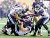 TREVOR HAGAN / WINNIPEG FREE PRESS
Winnipeg Blue Bombers running back Will Ford is swarmed by Toronto tacklers.