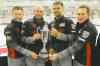 John Woods / Winnipeg Free Press
Mike McEwen (left) and his team of B.J. Neufeld, Matt Wozniak and Denni Neufeld hold the Dave Elias Memorial Trophy after winning the 2013 Canad Inns Prairie Classic.