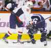 Trevor Hagan / the canadian press
The Capitals' Eric Fehr (16) two-hands Scheifele (55) in front of the Capitals bench during first-period action Tuesday.
