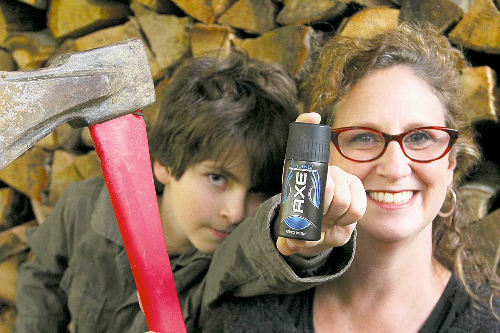 Axe man. Woman with axe. axe rise up. fire factory.
