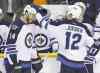 CP
Mark Humphrey / the associated press
Anthony Peluso celebrates with Olli Jokinen after scoring his first NHL goal.