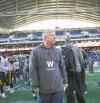 DAVID LIPNOWSKI / WINNIPEG FREE PRESS Winnipeg Blue Bombers head coach Tim Burke surveys the surroundings following Saturday�s loss to Hamilton. It might have been his last look at the field.