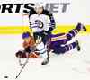 Canadian Press archives
Zach Redmond gives Edmonton Oilers right-winger Nail Yakupov something to remember in the pre-season in Edmonton. Redmond is back after the Jets called him up from St. John's.