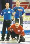 CP
Michael Burns / THE CANADIAN PRESSJohn Morris bellows at his front end as opposing skip Brad Jacobs (right) and third Ryan Fry take mental notes.