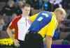 CP
Jonathan Hayward / the canadian press archivesBrad Gushue (left) will lend a hand to old foe Kevin Martin.
