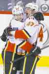 john woods / winnipeg free press
Calgary Flames Jiri Hudler (24) and Sven Baertschi (47) celebrate Hudler's goal in the third period.