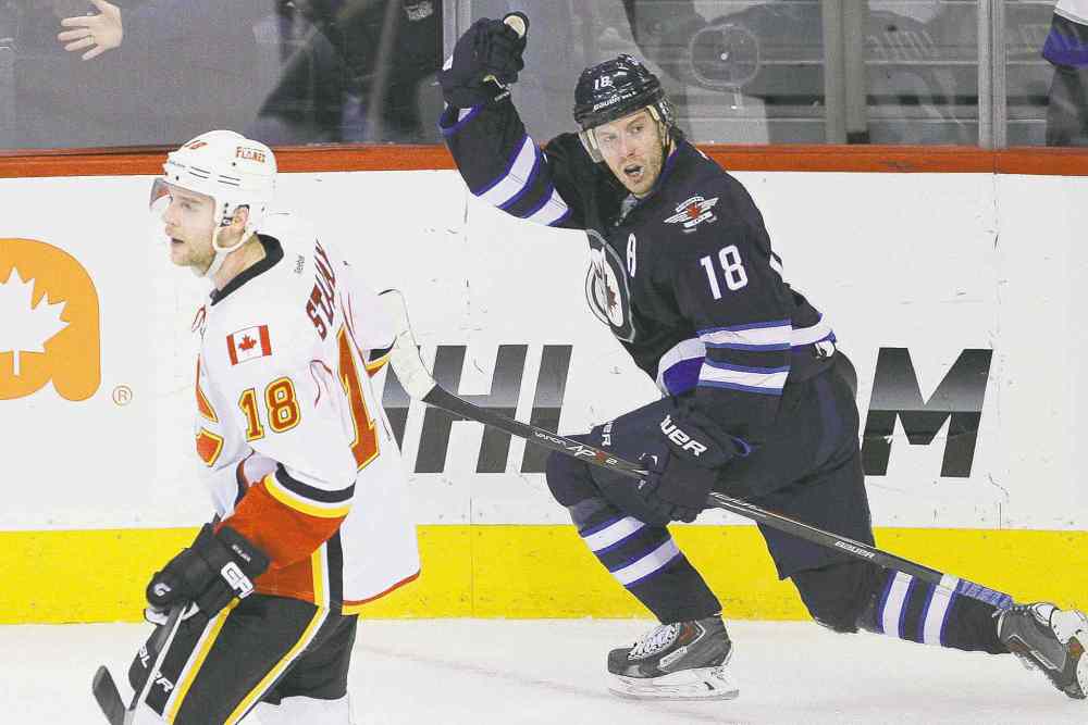 WINNIPEG FREE PRESS
John Woods / WINNIPEG FREE PRESS archives
Winnipeg Jets centre Bryan Little has celebrated scoring a goal on 12 occasions so far this season. He has added 11 assists for 23 points.