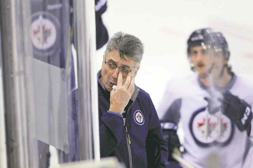 Boris Minkevich
BORIS MINKEVICH / WINNIPEG FREE PRESS
Much as he might want to, Jets coach Claude Noel can�t be bashing players over the head with a baseball bat. He is looking for other means of motivation.