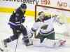 TREVOR HAGAN / WINNIPEG FREE PRESS
Jets� Matt Halischuk jumps over a shot as he tries to screen Wild goaltender Niklas Backstrom in the first period Saturday afternoon.
