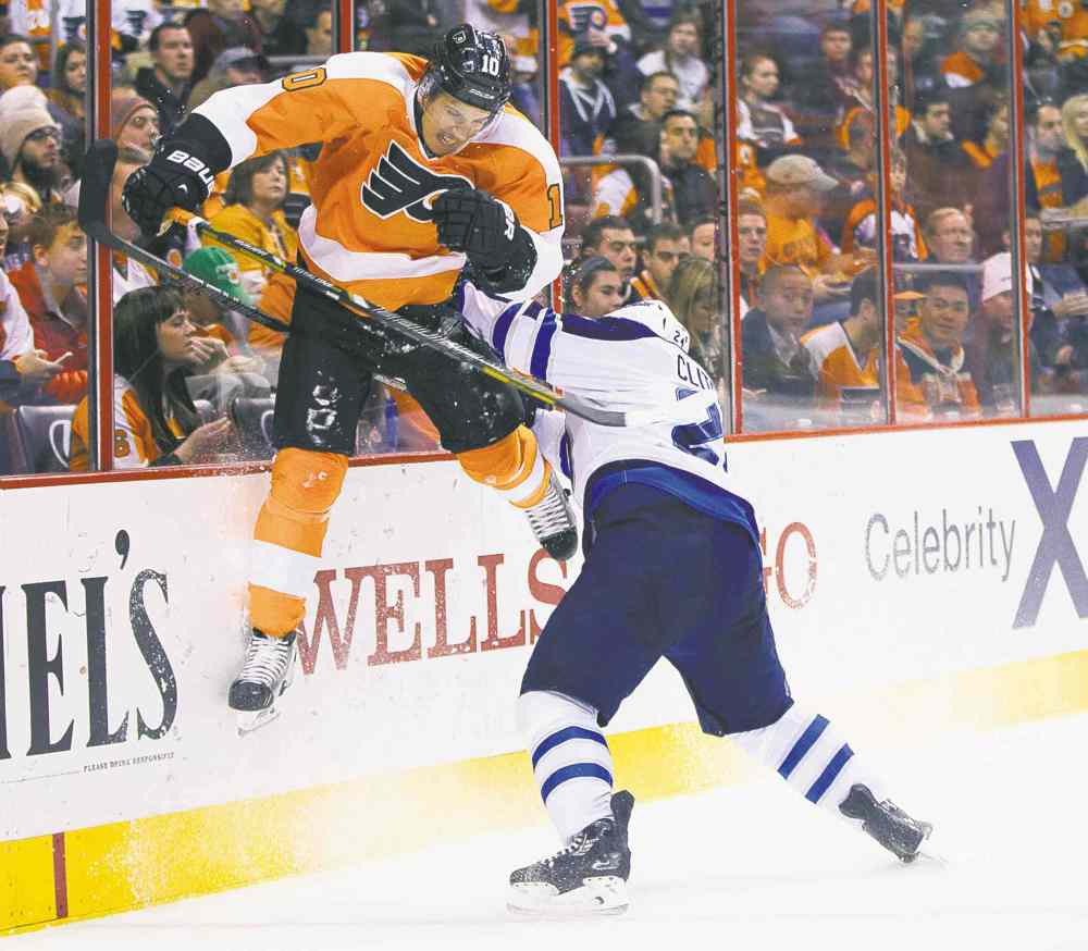 CP
Chris Szagola / the associated press
Jets blue-liner Grant Clitsome smashes Philadelphia�s Brayden Schenn into the glass during Friday�s game.