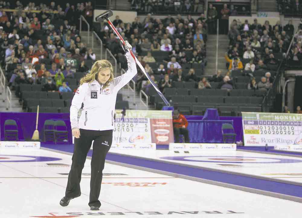 Ruth Bonneville / Winnipeg Free Press
Jennifer Jones celebrates her team�s win Thursday night in round-robin play. Tonight, she curls for the ultimate � a berth in the Winter Olympics.