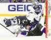 Tribune Media MCT
Dirk Shadd / Tampa Bay Times / MCTJets goalie Al Montoya takes a seat atop diminutive Martin St. Louis of the Tampa Bay Lightning.