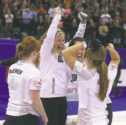 Jason Halstead
Jason Halstead / Winnipeg Free Press
Skip Jennifer Jones and teammates Dawn McEwen (from left), Jill Officer and Kaitlyn Lawes soak up the moment after earning their Olympic berth Saturday.