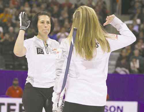 Jason Halstead
Jason Halstead / Winnipeg Free Press
Skip Jennifer Jones high-fives Jill Officer (left) during Saturday�s final.