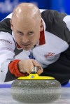 Canada's skip Kevin Koe competes during the gold medal game between Canada and Denmark at the world men's curling championship 2016 in the St. Jakobshalle in Basel, Switzerland, on Sunday, April 10, 2016. (Georgios Kefalas/Keystone via AP)