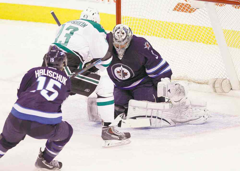 CP
John Woods / the canadian press
Dallas Stars� Valeri Nichushkin scores on beleaguered Jets goaltender Ondrej Pavelec.