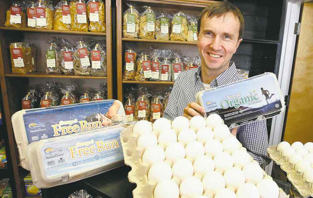 KEN GIGLIOTTI / WINNIPEG FREE PRESS
Hermann Grauer, of Nature's Farm in Steinbach, with some of the company's products. The organic food industry is worth $3.5 billion in Canada.
Ken Gigliotti / Winnipeg Free Press