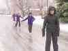 CP
Andrea Loken / THE CANADIAN PRESSChilden skate on an ice-covered street in Kingston, Ont.. after an ice storm that swept through Ontario and Quebec.