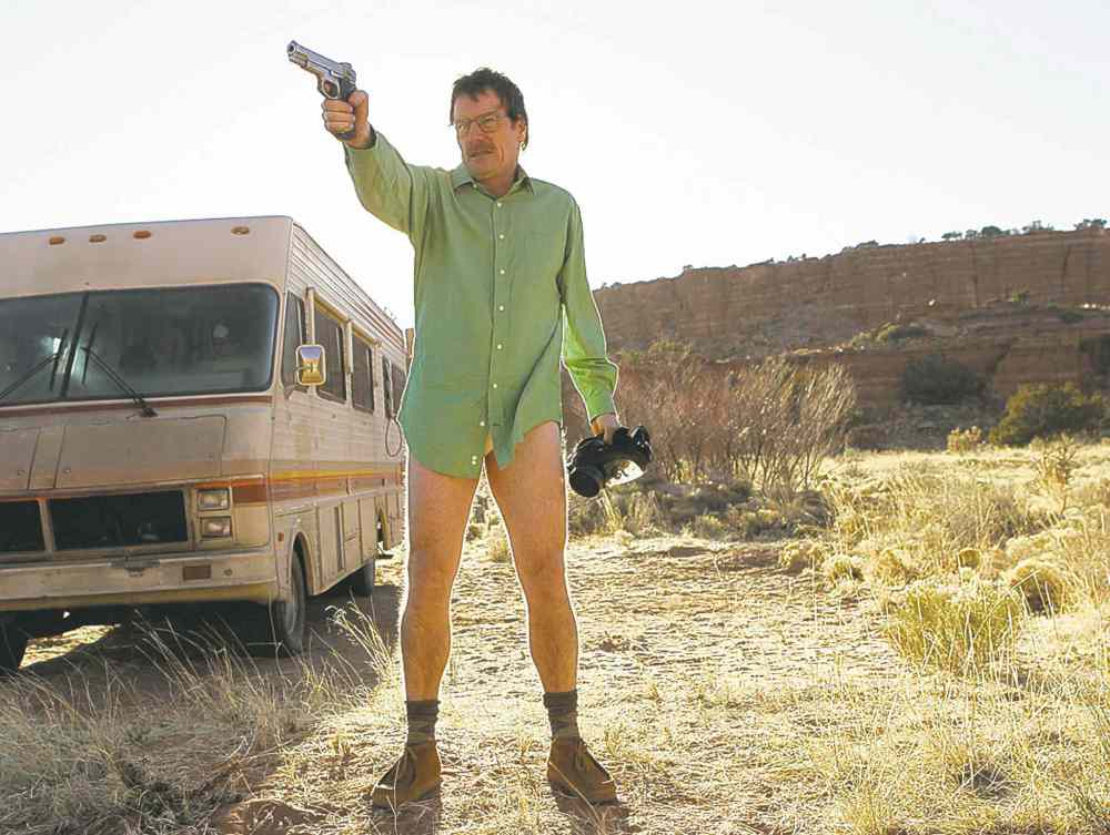 CP
This image released by AMC shows Walter White, played by Bryan Cranston, next to the Winnebago he uses as a mobile meth lab in the pilot episode of