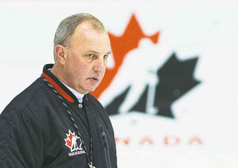 CP
Team Canada head coach Brent Sutter watches a drill during the start of world Juniors selection camp in Toronto on Friday, Dec. 13, 2013. THE CANADIAN PRESS/Nathan Denette