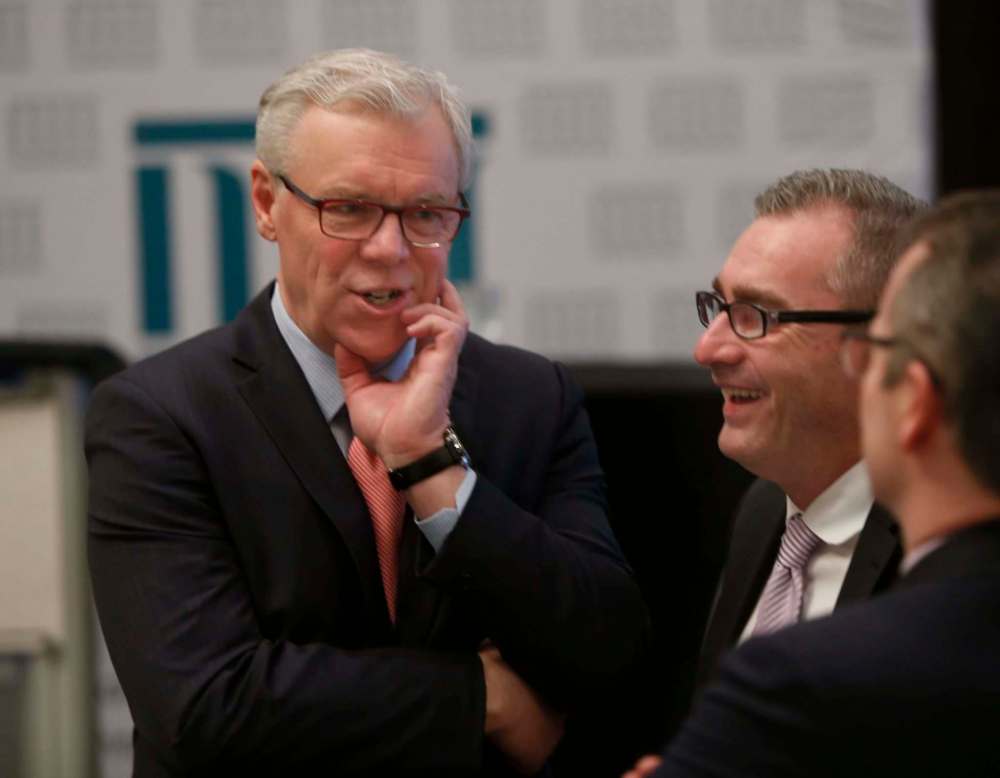 WAYNE GLOWACKI / WINNIPEG FREE PRESS
At left, NDP leader Greg Selinger chats with Chuck Davidson, president and CEO of the Manitoba Chambers of Commerce, at the Chambers breakfast Wednesday. Selinger was the keynote speaker at the event.