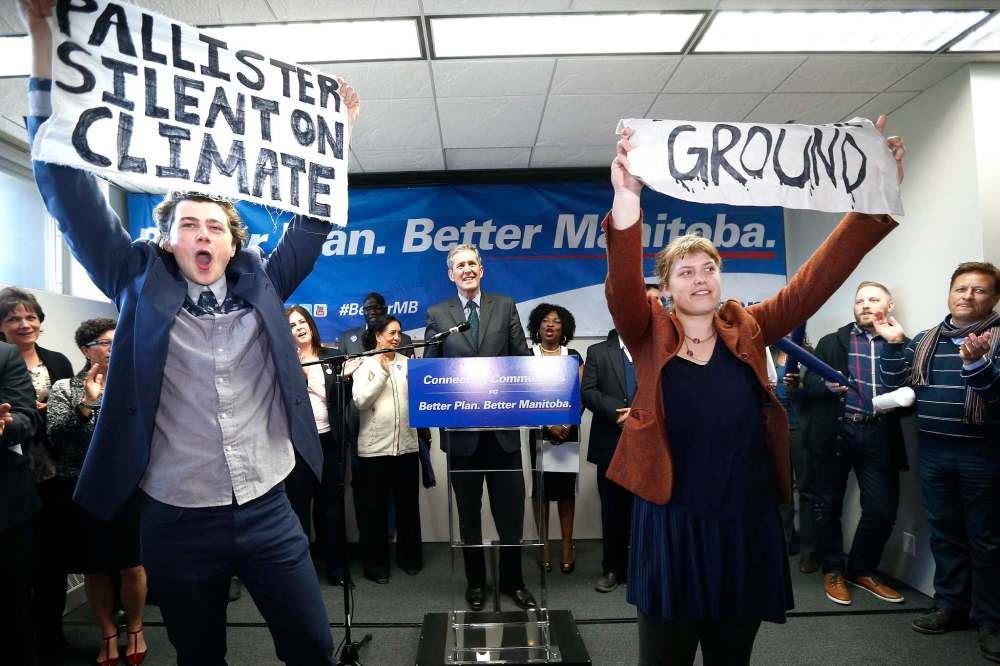 JOHN WOODS / WINNIPEG FREE PRESS 
When environmentalists Riley McMurray and Natalie Dyck interrupt a PC party rally, Pallister let the moment unfold.