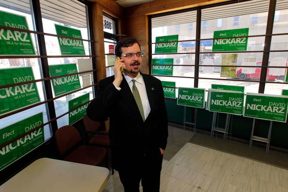 BORIS MINKEVICH / WINNIPEG FREE PRESS
Wolseley Green candidate Dave Nickarz takes a call at his campaign office on Portage Avenue.