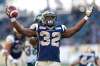 John Woods / The Canadian Press files
Winnipeg Blue Bombers' Cameron Marshall (32) celebrates his touchdown against the Edmonton Eskimos during the second half of CFL action in Winnipeg Saturday, October 3, 2015.