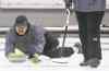 TREVOR HAGAN / WINNIPEG FREE PRESSChurchill skip Luke Spence eyes the broom as he releases a shot at Rossmere Saturday during the Manitoba Open. Spence lost a wild 8-5 affair.