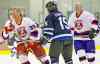 MIKE DEAL / WINNIPEG FREE PRESS
photos by MIKE DEAL / WINNIPEG FREE PRESSFormer NHLer Perry Miller (99), Eagle and Hawk�s Vince Fontaine (15) and former NHLer Mike Keane in a Juno Cup preparation scrimmage at the MTS Iceplex on Thursday.