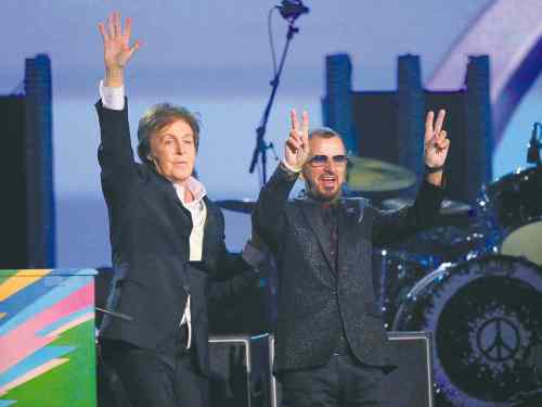 Matt Sayles / Invision /The Associated Press
Paul McCartney (left) and Ringo Starr perform onstage at the 56th annual Grammy Awards at Staples Center on Sunday night in Los Angeles.