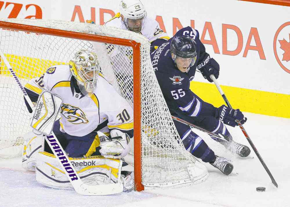 John Woods / WINNIPEG FREE PRESS files
Winnipeg rookie centre Mark Scheifele (55), an emerging star, is a member of the youngest roster in the NHL.