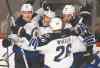 Peter McCabe / the canadian press files 
Blake Wheeler celebrates a recent goal with his Jets teammates. The forward says his team is now fulfilling the potential it has always had.