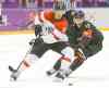 Mark Humphrey / The Associated Press
Austria's Oliver Setzinger (left) and Canada's Jonathan Toews chase the rubber Friday.