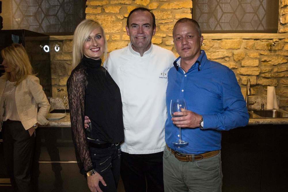 MIKE DEAL / WINNIPEG FREE PRESS
Magellan Luxury Hotels president Dan Davidson (right) and his wife, Shaleen Davidson, enjoy their time with chef Charlie Palmer.