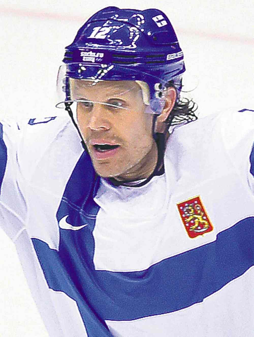 Nathan Denette / the canadian press files
Olli Jokinen and the Finns have a semifinal date with Sweden.