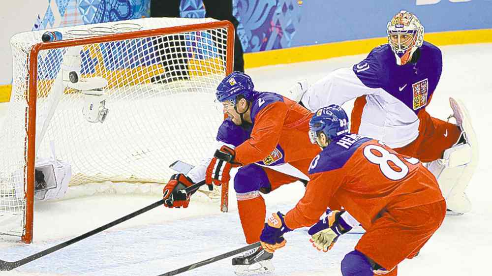 Chuck Myers / MCT
A shot by USA forward Dustin Brown beats Czech Republic goaltender Ondrej Pavelec in a quarter-final game in Sochi on Wednesday.