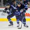 Phil Hossack / Winnipeg Free Press
Linemates Devin Setoguchi (right) and Michael Frolik were among Winnipeg's most effective players against the stifling brilliance of the Kings' defence.