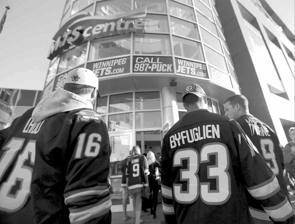 TREVOR HAGAN / WINNIPEG FREE PRESS files
Winnipeg Jets fans walk into the MTS Centre prior to a game.