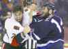 TREVOR HAGAN / WINNIPEG FREE PRESS
Ottawa�s Jared Cowen (left) and Winnipeg�s Anthony Peluso engage in second-period fisticuffs.