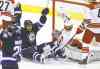 Trevor Hagan / Winnipeg Free Press
Big Buff thinks the Jets have scored — but no. Mark Stuart's shot found the twine behind goalie Cam Ward, but the refs ruled Buff had interfered with Ward.