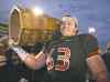 Jacques Boissinot / The Canadian Press Files
Laval's Pierre Lavertu, holding the Dunsmore Cup, impressed Winnipeg Blue Bombers head coach Mike O'Shea.