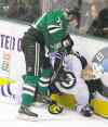 CP
L.M. Otero / The Associated Press
Bryan Little is knocked down.