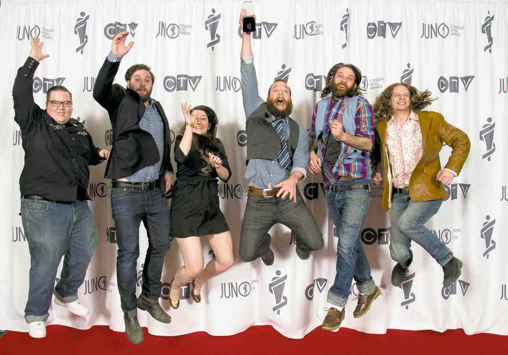 Jonathan Hayward / The Canadian Press
The Strumbellas celebrate their Juno Award for Roots and Traditional Album of the Year.