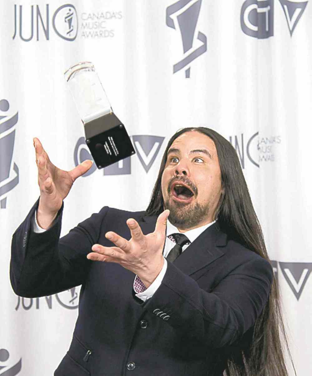 Jonathan Hayward / The Canadian Press
George Leach celebrates his Juno win for Aboriginal Album of the Year.
