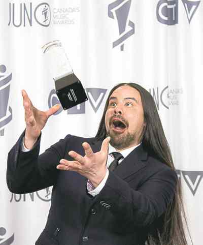 Jonathan Hayward / The Canadian Press
George Leach celebrates his Juno win for Aboriginal Album of the Year.