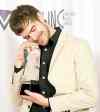 CP
Ryan Hemsworth celebrates his Juno Award for Electronic Album of the year during the Juno Award in Winnipeg on Saturday, March 29, 2014. THE CANADIAN PRESS/Jonathan Hayward