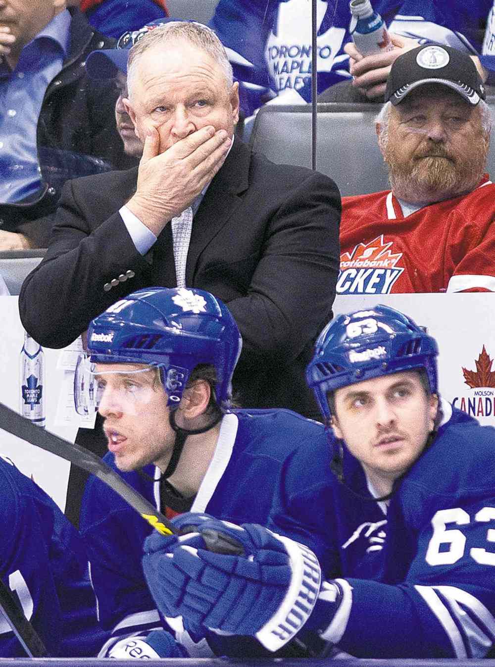 Nathan Denette / The Canadian Press
Hmmm. Maple Leafs head coach Randy Carlyle ponders the situation.