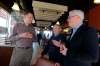 BORIS MINKEVICH / WINNIPEG FREE PRESS
River East NDP candidate Jody Gillis (from left), former MLA Harry Schellenberg and Premier Greg Selinger chat at a Tim Hortons shop on Lagimodiere Boulevard Monday.
