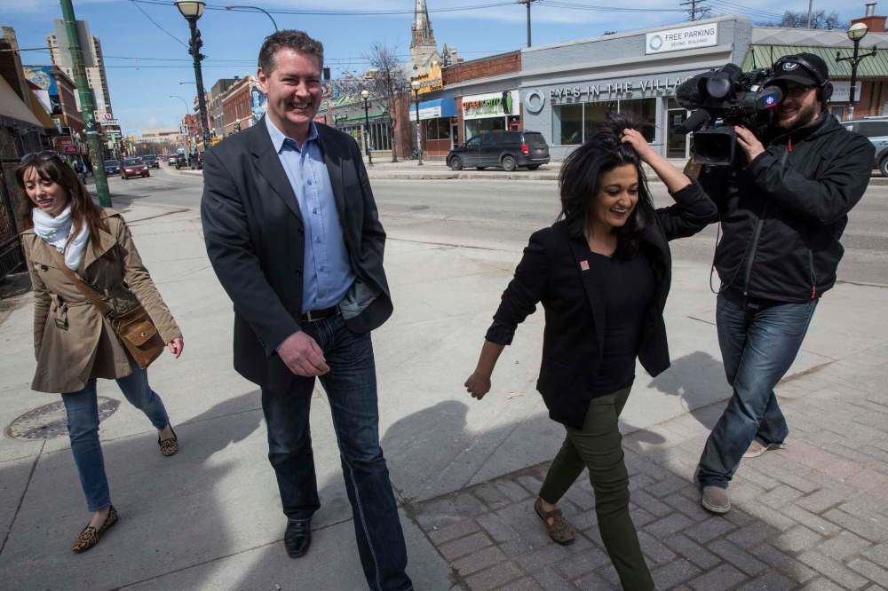 MIKE DEAL / WINNIPEG FREE PRESS
Liberal Leader Rana Bokhari walks along Osborne Street Monday on her way to talk to the media.
